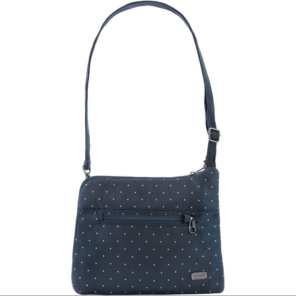 Pacsafe Handbags - NWT Pacsafe daysafe anti-theft slim crossbody dot